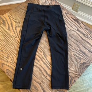 Lululemon black capri pants with side pockets size 4